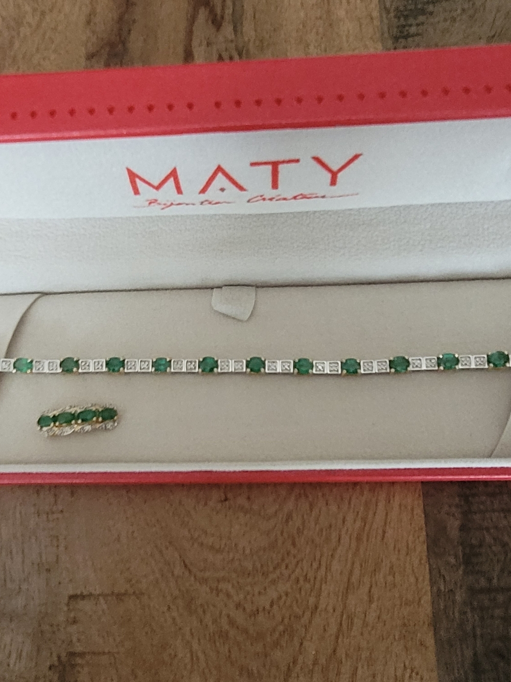 18K Gold, Diamonds And Emeralds.